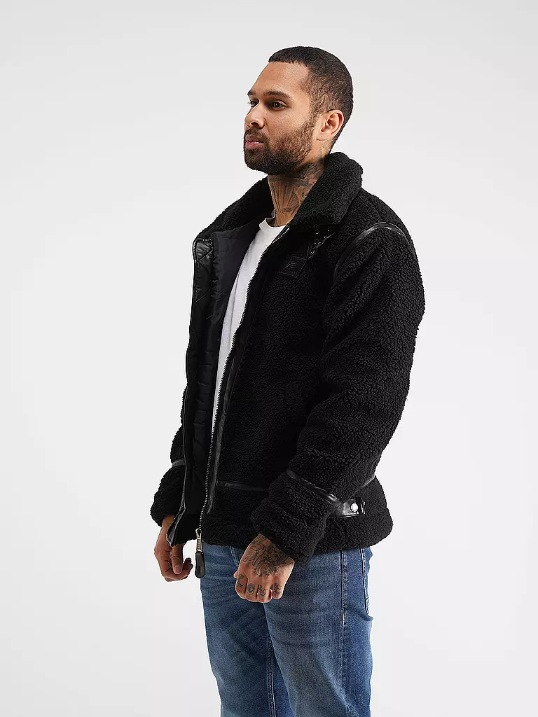 ALPHA INDUSTRIES | Jacke in Felloptik | schwarz