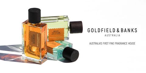 Abgebildet sind drei Parfümflakons von Goldfield & Banks mit dunklen Verschlüssen und rechteckigen Glasbehältern, die mit verschiedenfarbigen Flüssigkeiten gefüllt sind. Der Text lautet „Goldfield & Banks Australia“ mit dem Slogan „Australiens erstes Parfümhaus“.
