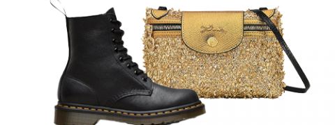 Ein schwarzer Schnürstiefel mit dicker Sohle steht neben einer kleinen Handtasche mit goldener Struktur, schwarzem Reißverschluss und Riemen.