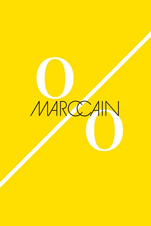 Gelber Hintergrund mit großem weißen Prozentzeichen. Quer über das Symbol steht in schwarzer Schrift der Markenname „Marc Cain“.