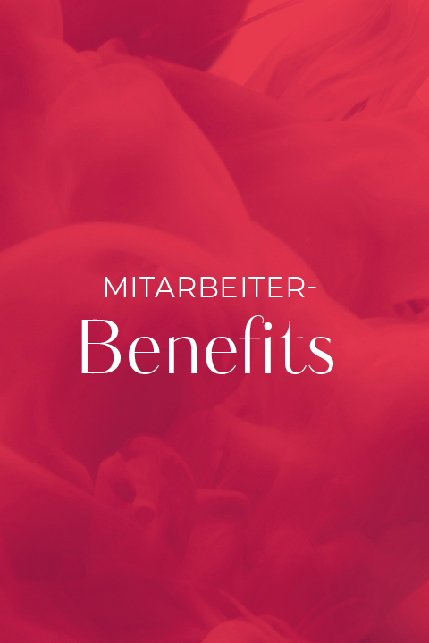 Der Text „Mitarbeiter-Benefits“ ist auf einem Hintergrund aus wirbelnden Rot- und Rosatönen zentriert.