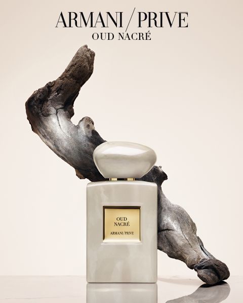 Ein Raster aus neun Armani/Privé-Parfümflaschen mit verschiedenfarbigen Verschlüssen, angeordnet in drei Reihen vor einem hellen Hintergrund. Der Text darunter lautet „Armani/Privé Haute Couture Fragrances“.