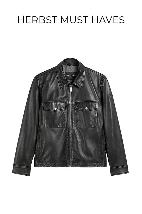 Schwarze Lederjacke mit einem Frontreißverschluss, zwei Brusttaschen mit Klappen und Knöpfen sowie langen Ärmeln. Der Text "FASHION TIPP" erscheint über der Jacke auf weißem Hintergrund.