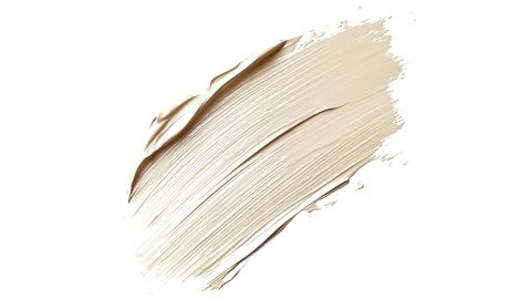 Ein beiges, cremiges Make-up-Foundation-Muster auf weißem Hintergrund mit glatten, strukturierten Pinselstrichen.