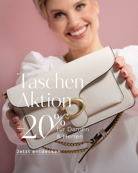 Eine lächelnde Person im weißen Hemd hält eine beige Lederhandtasche mit einer Goldkette hoch. Deutscher Text auf dem Bild wirbt für 20 % Rabatt auf Taschen für Damen und Herren.