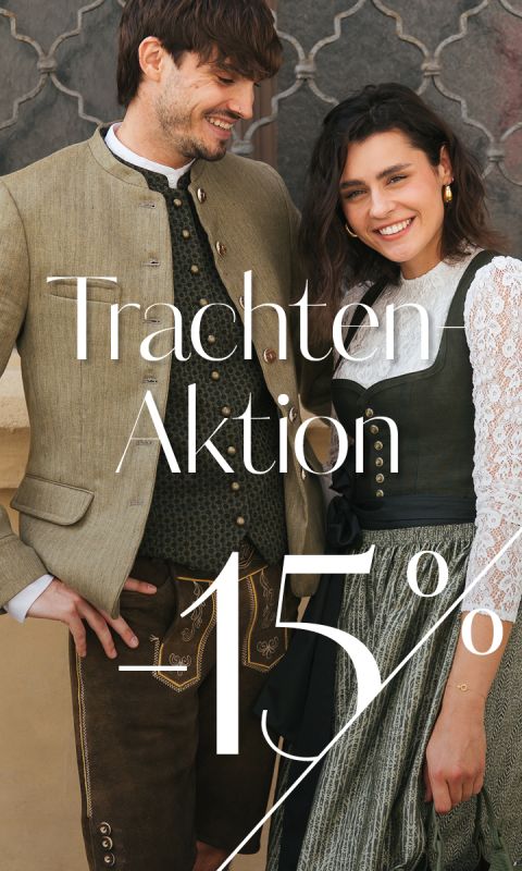 Zwei Menschen in traditioneller bayerischer Tracht lächeln. Der darüberliegende Text lautet: „Trachten-Aktion 15 %“.