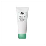 Eine weiße Tube „Origins Checks and Balances Polishing Face Scrub“ mit grüner Kappe ist mittig auf einem schlichten weißen Hintergrund abgebildet.